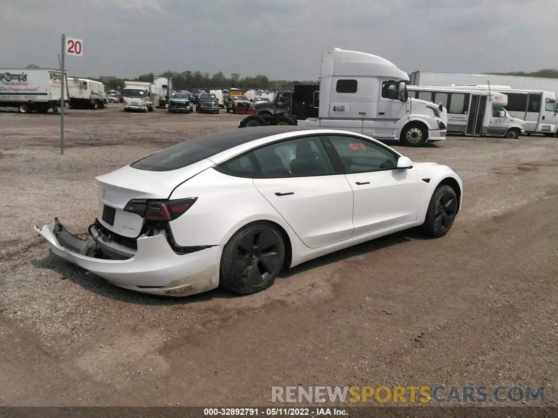 4 Photograph of a damaged car 5YJ3E1EBXNF128284 TESLA MODEL 3 2022