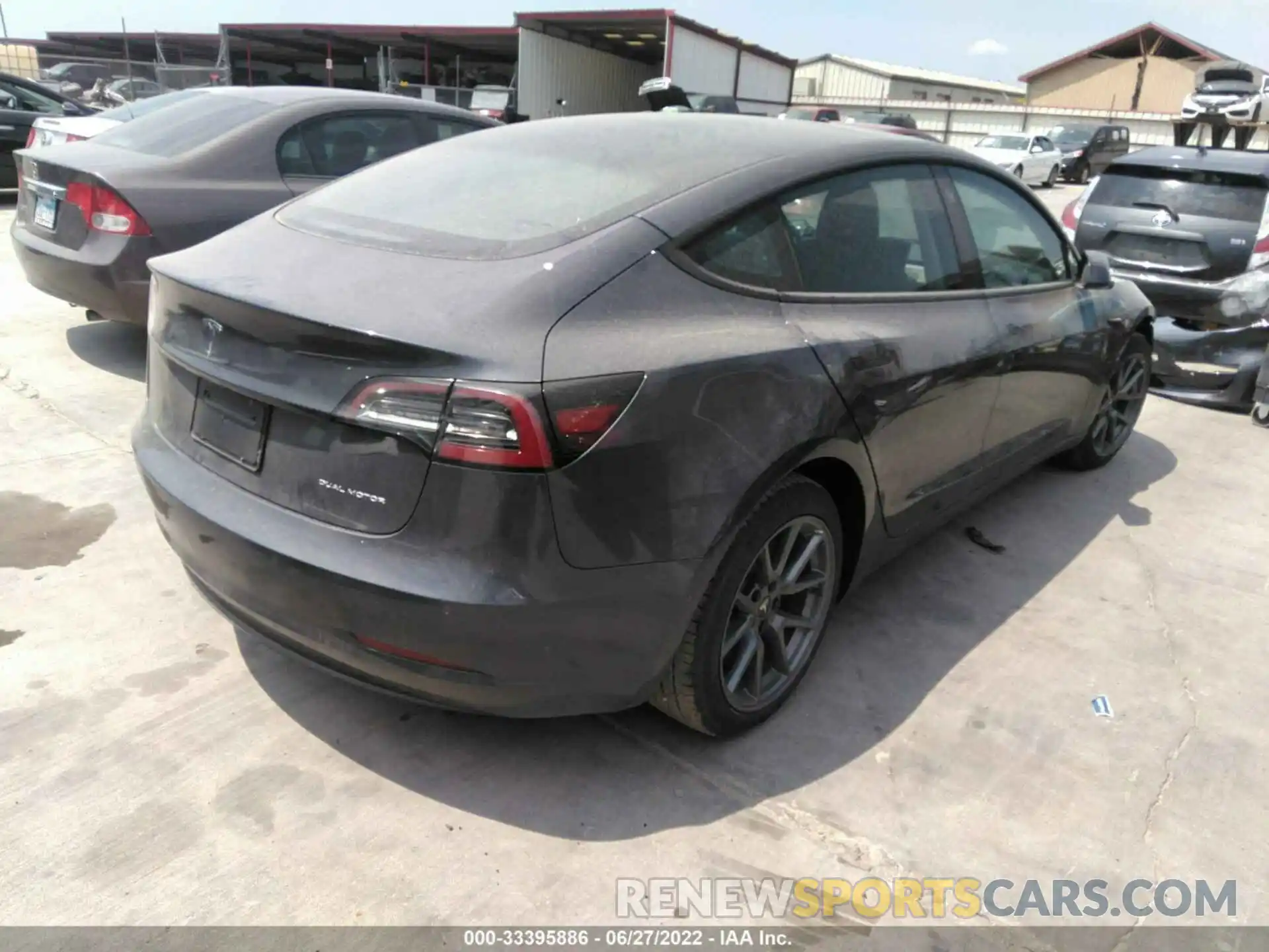 4 Photograph of a damaged car 5YJ3E1EBXNF128673 TESLA MODEL 3 2022