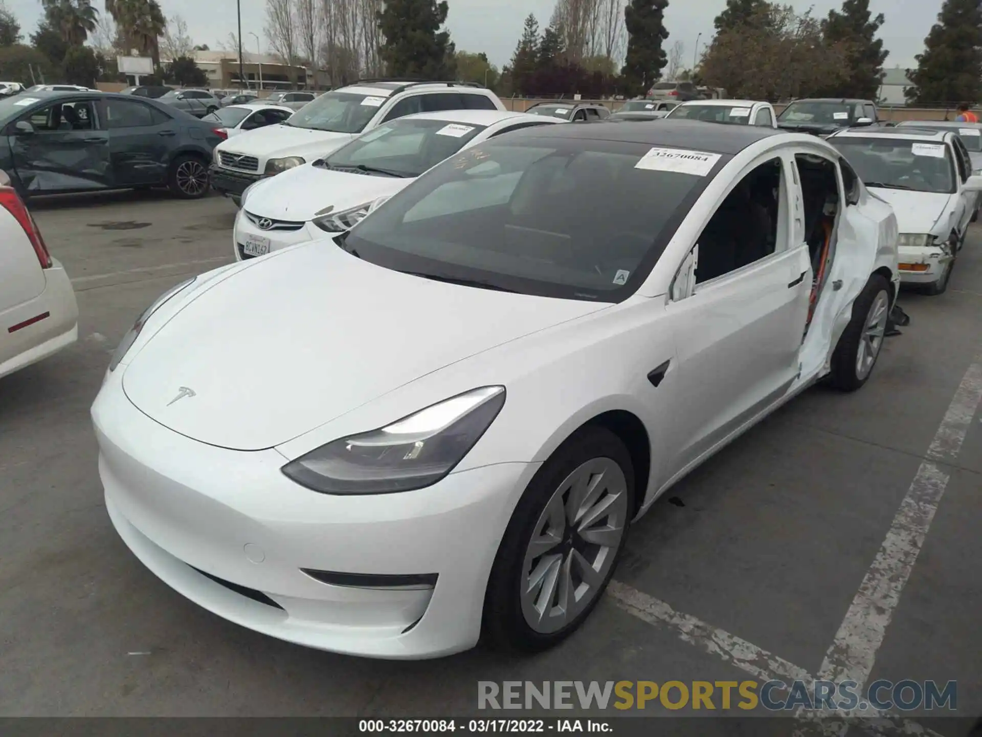 2 Photograph of a damaged car 5YJ3E1EBXNF128981 TESLA MODEL 3 2022