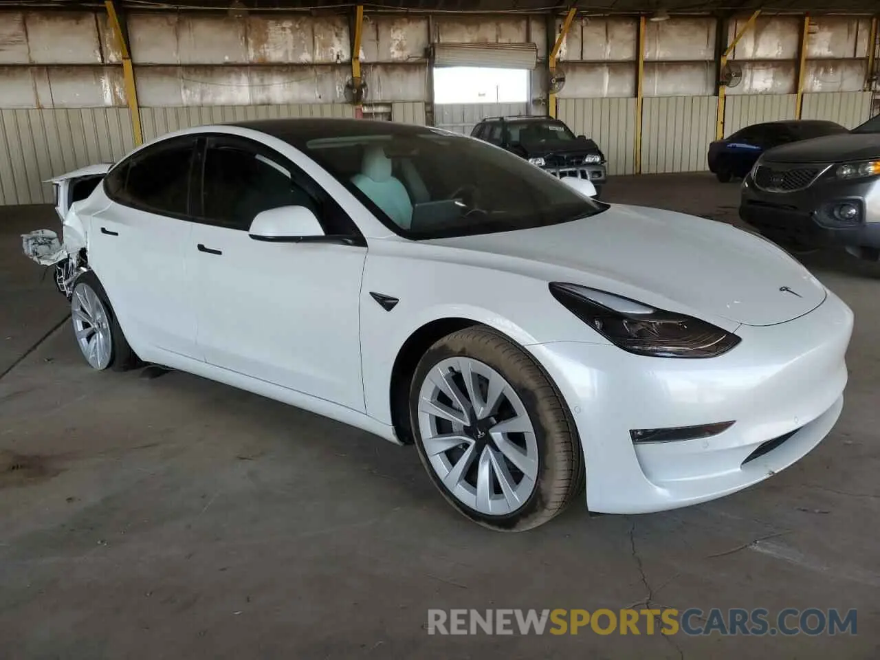4 Photograph of a damaged car 5YJ3E1EBXNF152097 TESLA MODEL 3 2022