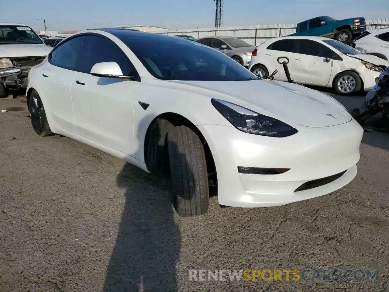 4 Photograph of a damaged car 5YJ3E1EBXNF153654 TESLA MODEL 3 2022