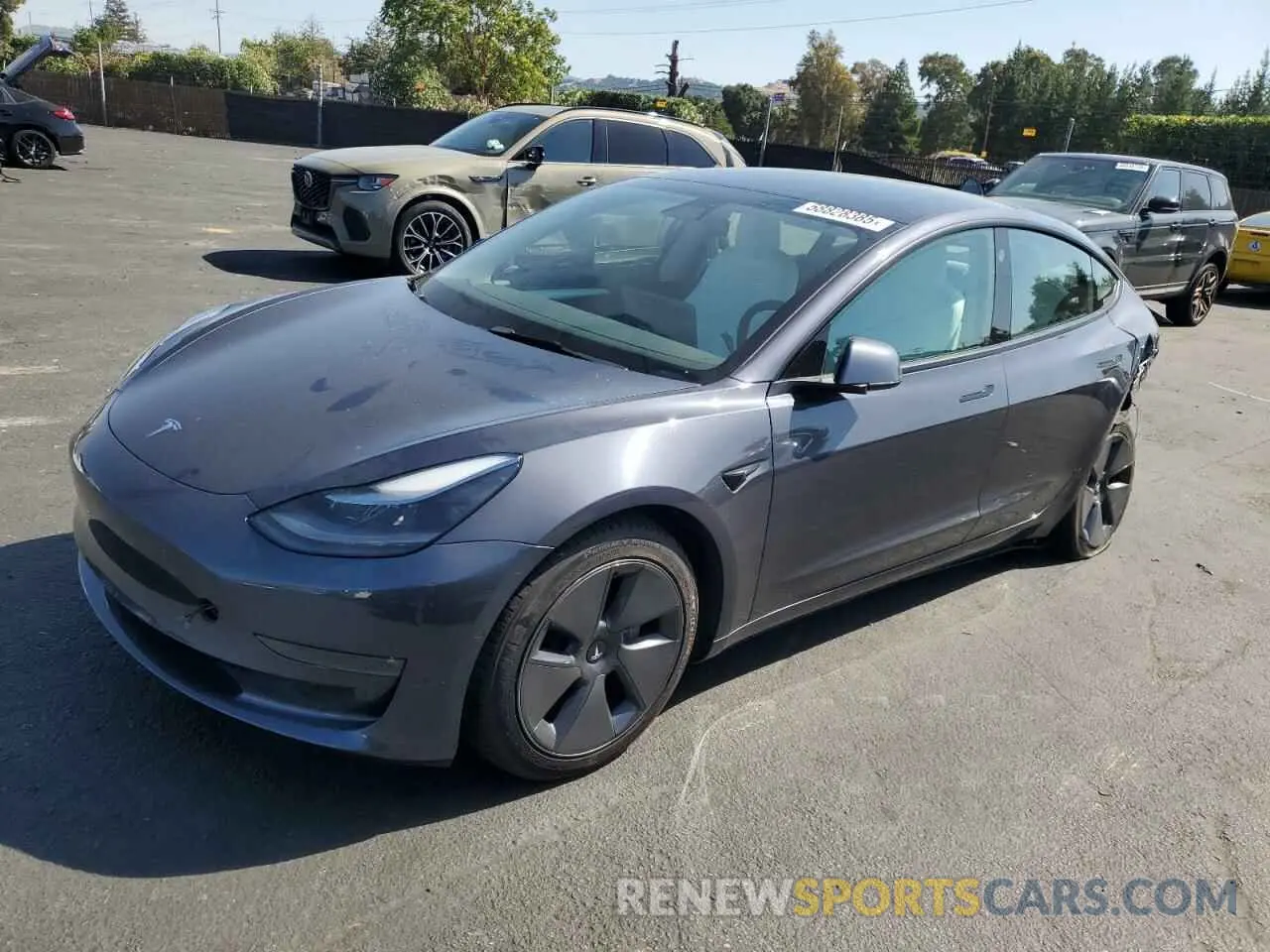 1 Photograph of a damaged car 5YJ3E1EBXNF155050 TESLA MODEL 3 2022