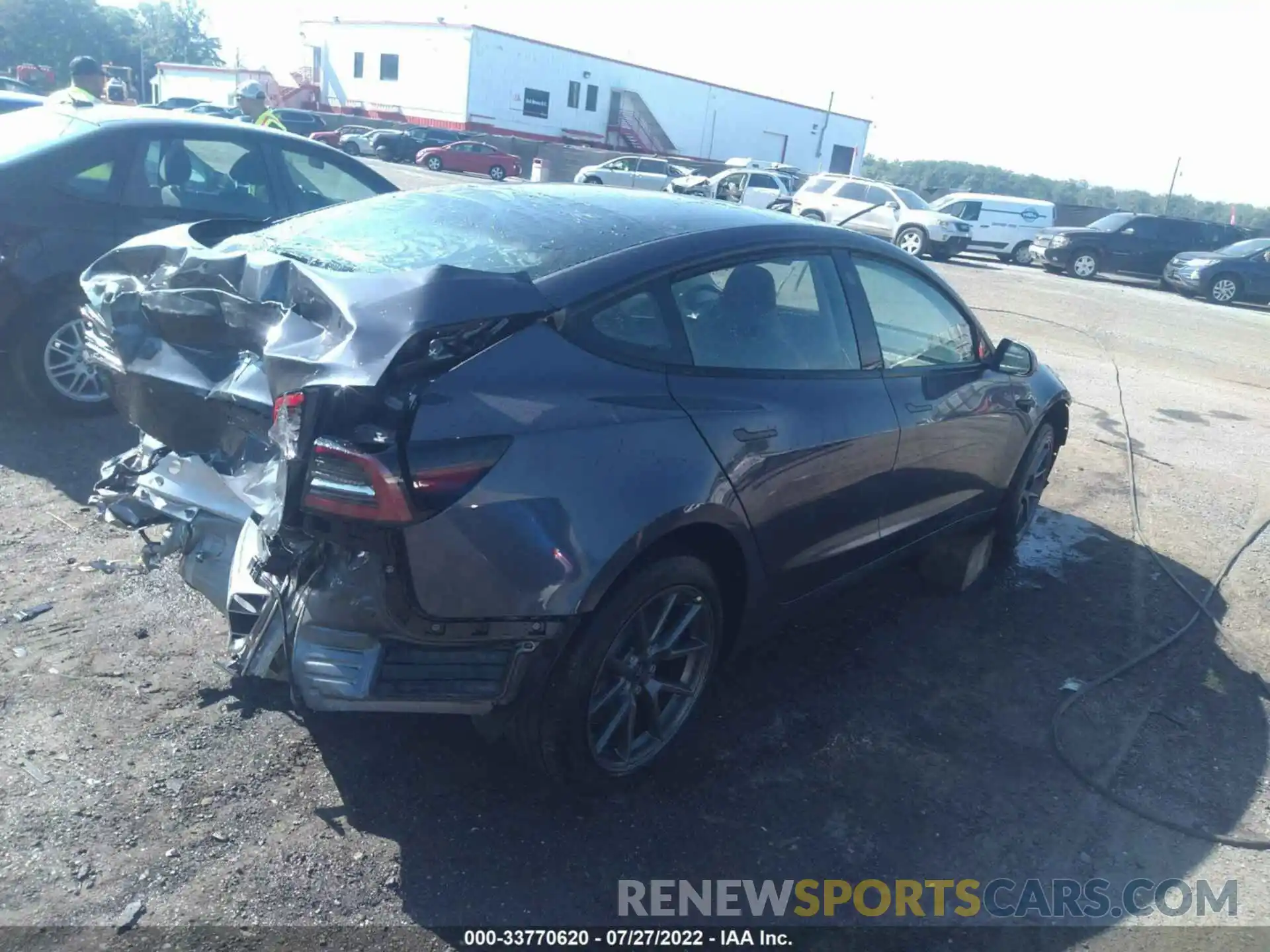 4 Photograph of a damaged car 5YJ3E1EBXNF170230 TESLA MODEL 3 2022