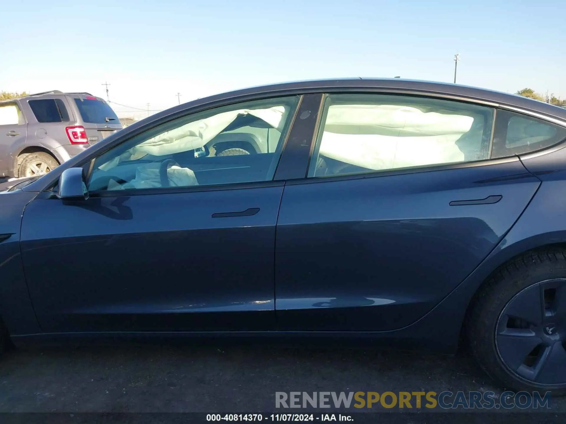 14 Photograph of a damaged car 5YJ3E1EBXNF170518 TESLA MODEL 3 2022