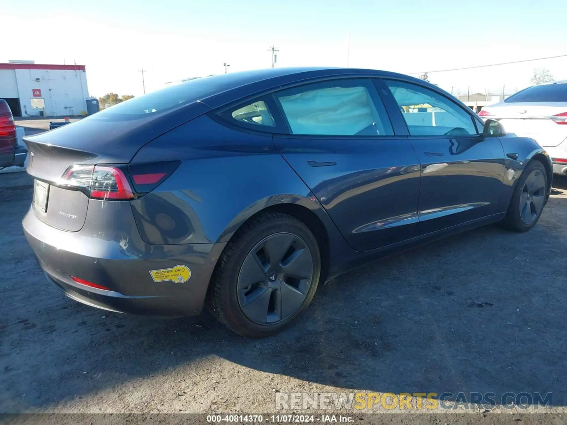 4 Photograph of a damaged car 5YJ3E1EBXNF170518 TESLA MODEL 3 2022