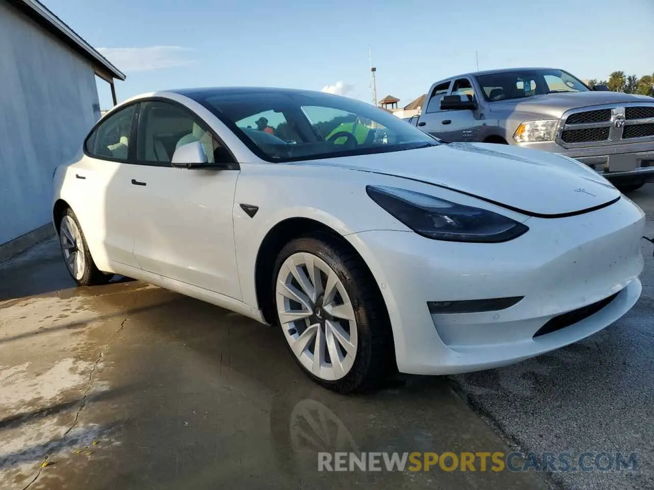 4 Photograph of a damaged car 5YJ3E1EBXNF181454 TESLA MODEL 3 2022