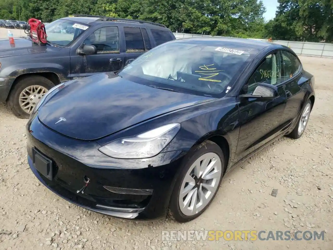 2 Photograph of a damaged car 5YJ3E1EBXNF186511 TESLA MODEL 3 2022