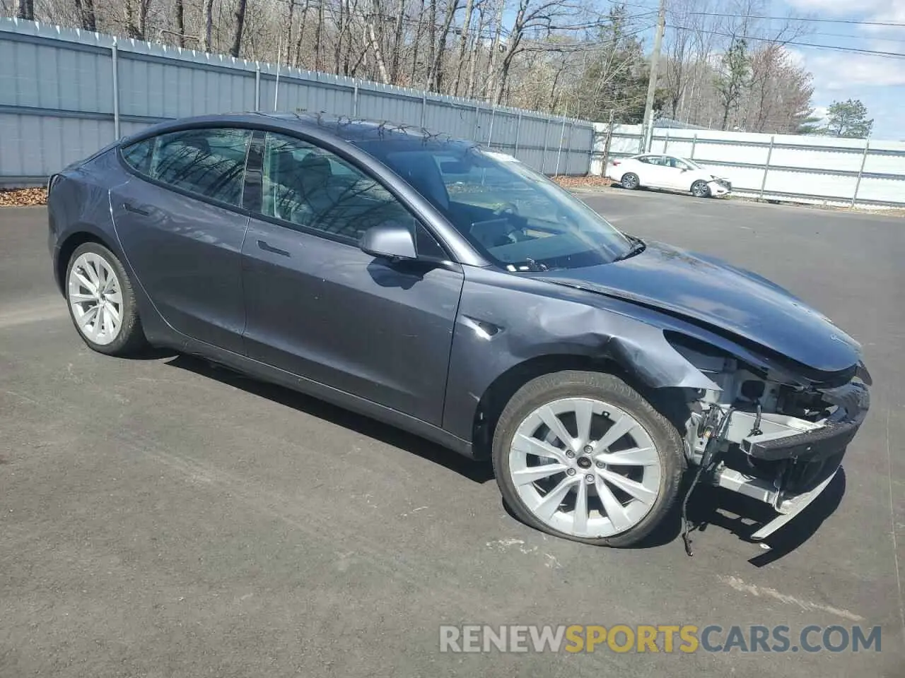 4 Photograph of a damaged car 5YJ3E1EBXNF188596 TESLA MODEL 3 2022