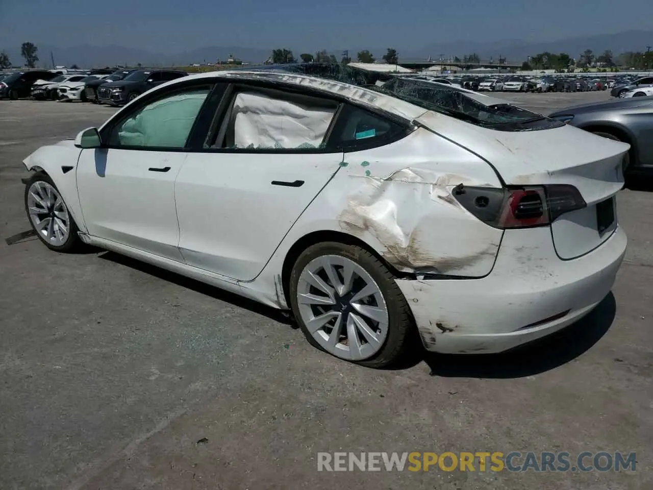 2 Photograph of a damaged car 5YJ3E1EBXNF211018 TESLA MODEL 3 2022