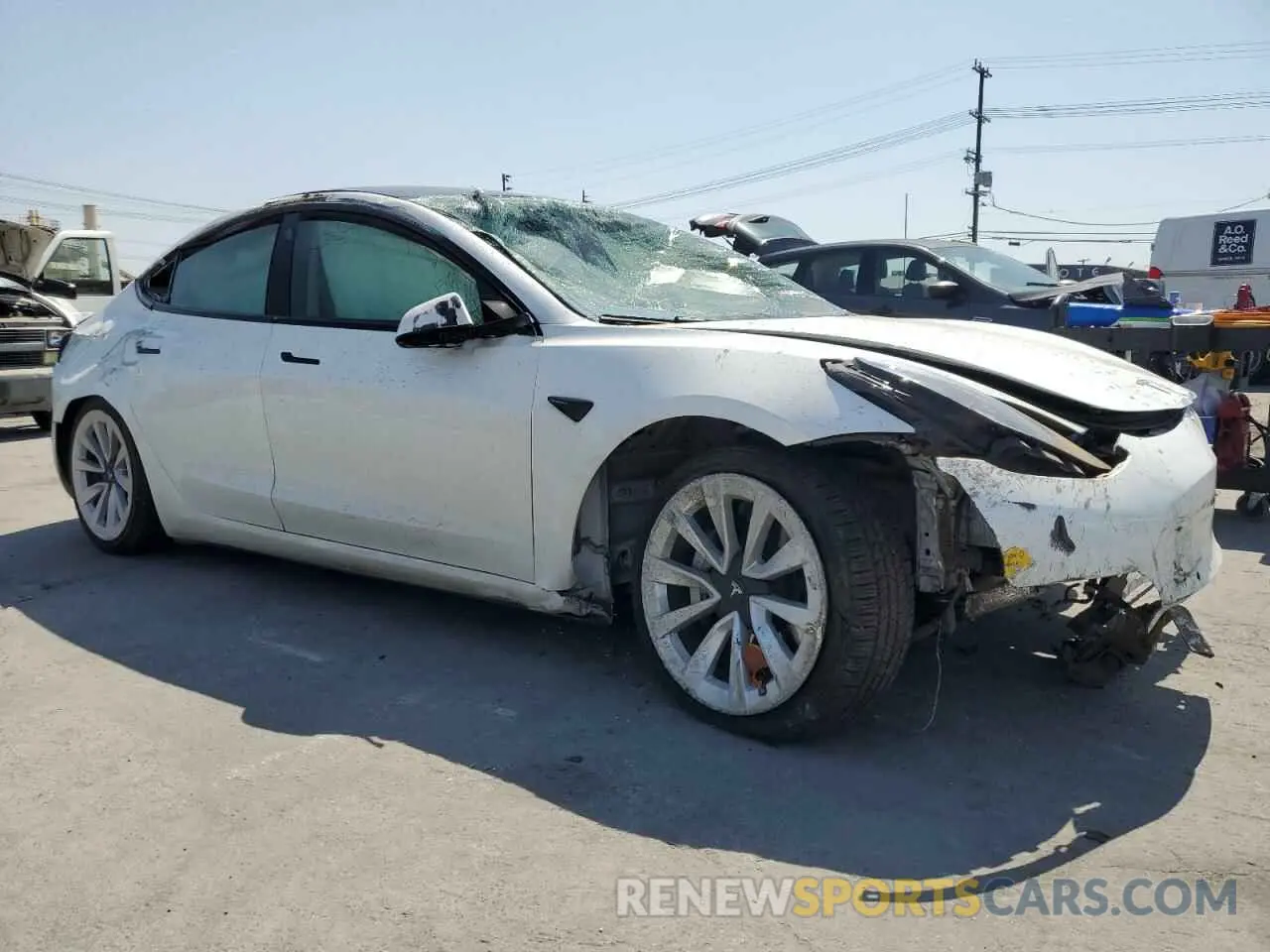 4 Photograph of a damaged car 5YJ3E1EBXNF211018 TESLA MODEL 3 2022