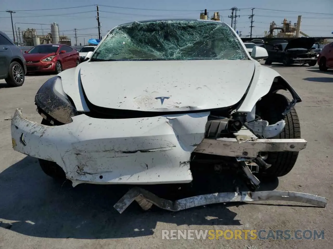 5 Photograph of a damaged car 5YJ3E1EBXNF211018 TESLA MODEL 3 2022