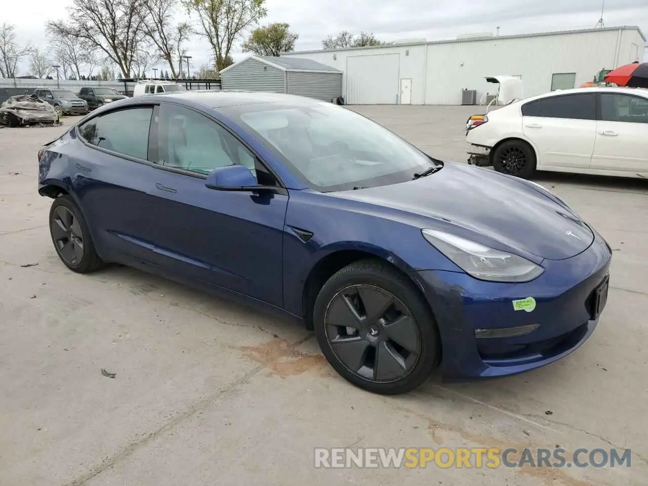 4 Photograph of a damaged car 5YJ3E1EBXNF230877 TESLA MODEL 3 2022