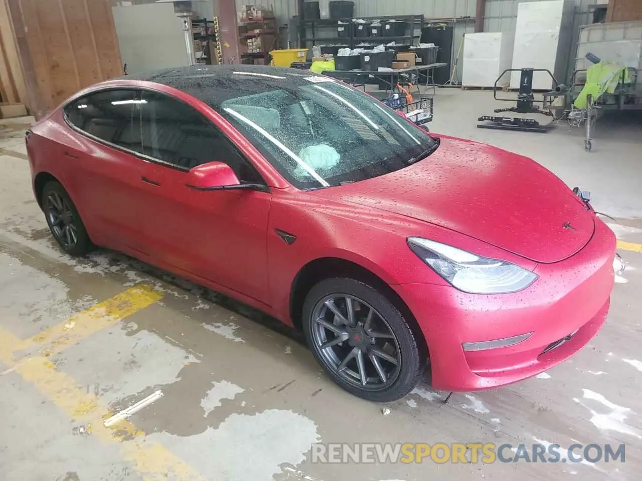 4 Photograph of a damaged car 5YJ3E1EBXNF240857 TESLA MODEL 3 2022