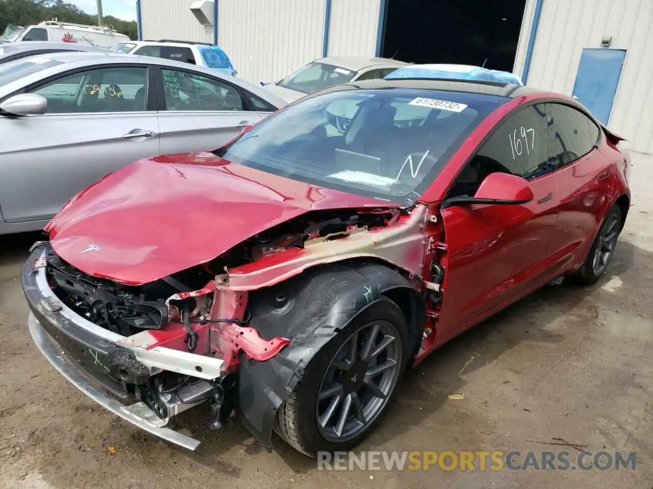 2 Photograph of a damaged car 5YJ3E1EBXNF247730 TESLA MODEL 3 2022