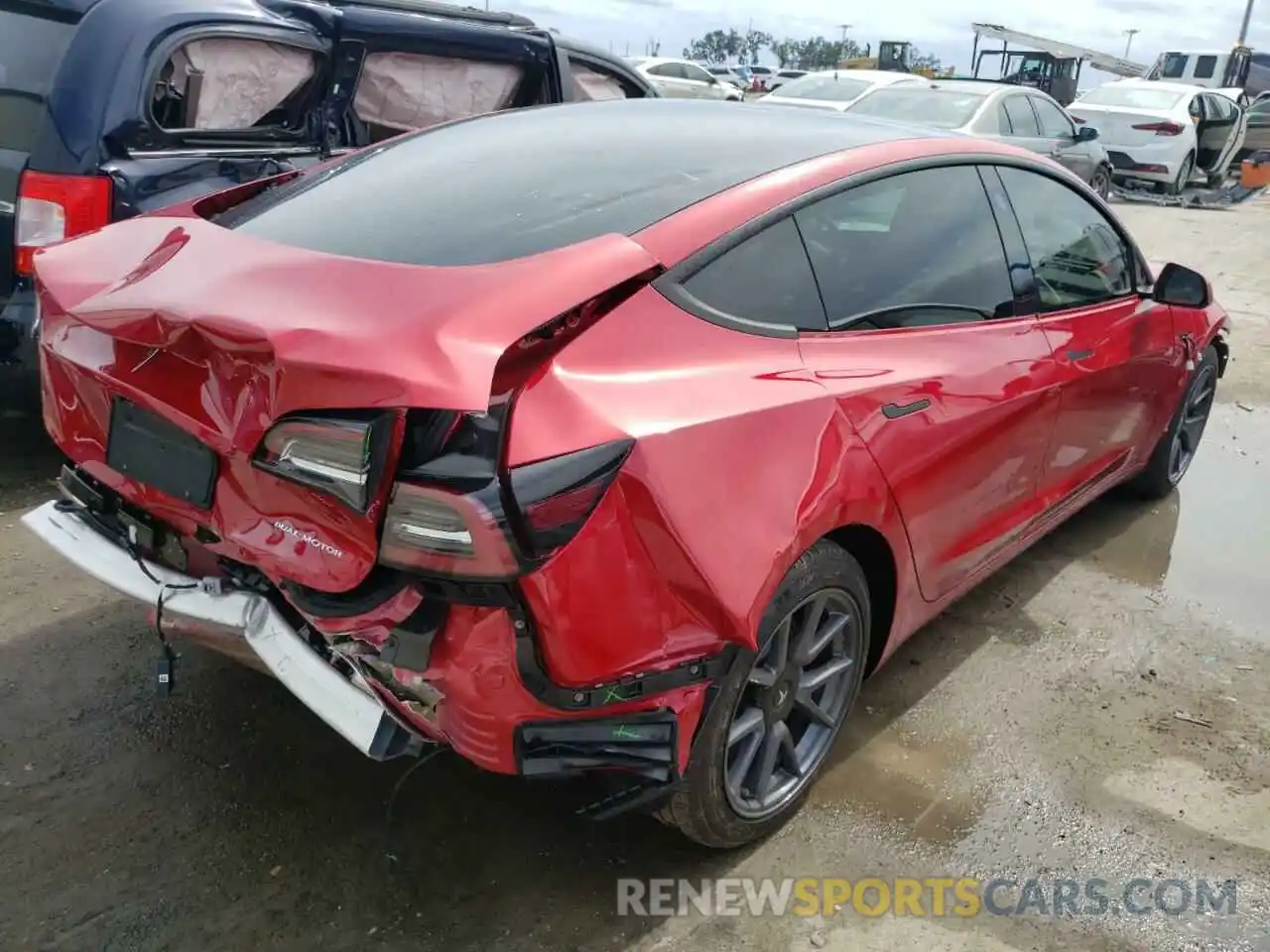 4 Photograph of a damaged car 5YJ3E1EBXNF247730 TESLA MODEL 3 2022