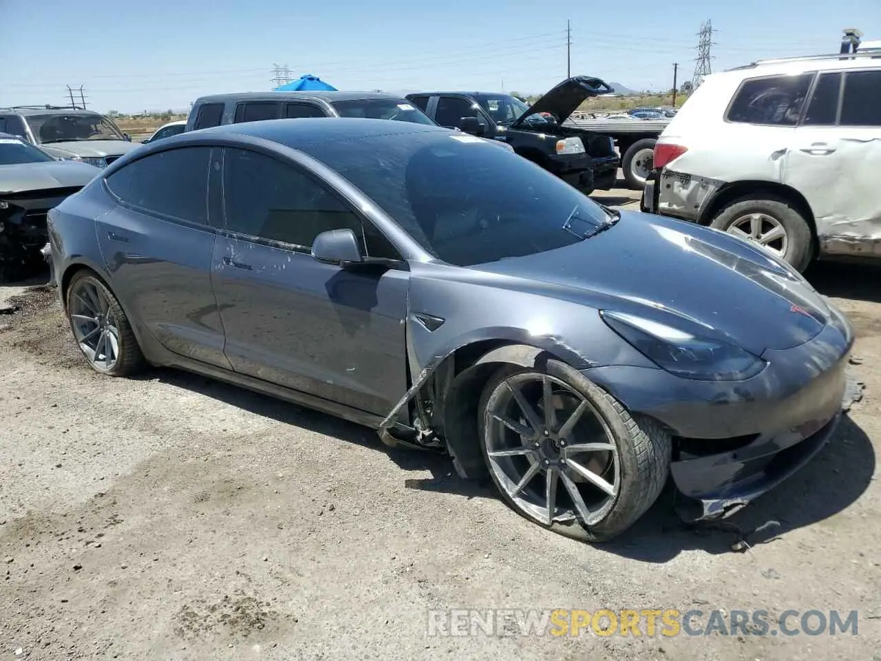 4 Photograph of a damaged car 5YJ3E1EBXNF263832 TESLA MODEL 3 2022