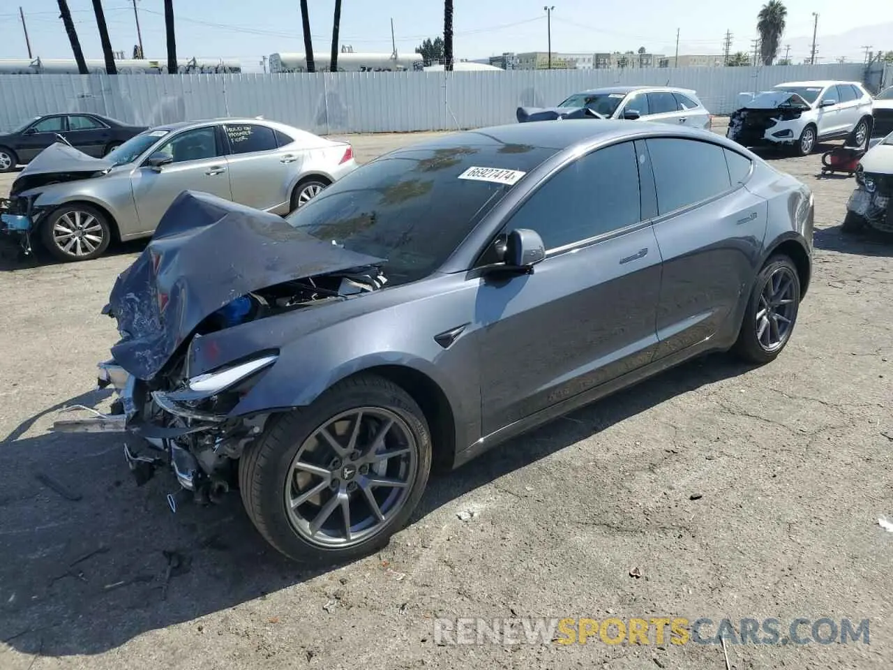 1 Photograph of a damaged car 5YJ3E1EBXNF267671 TESLA MODEL 3 2022
