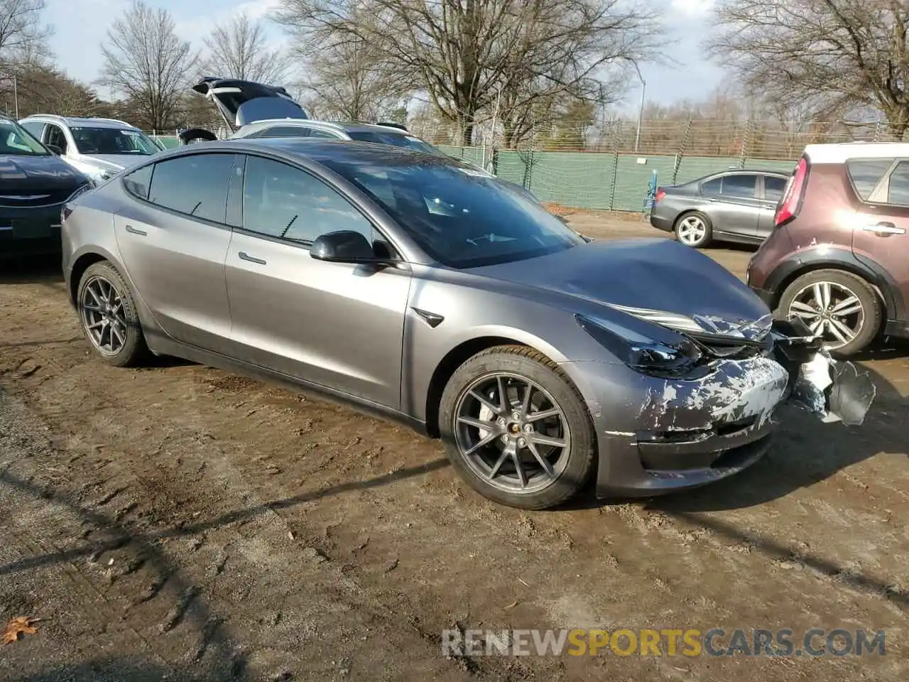 4 Photograph of a damaged car 5YJ3E1EBXNF272496 TESLA MODEL 3 2022