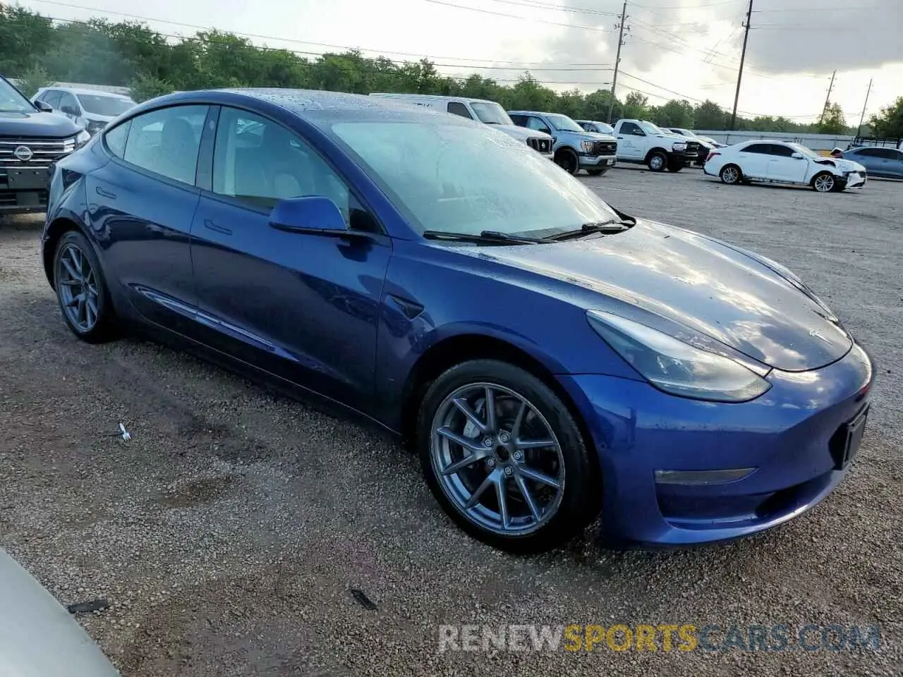 4 Photograph of a damaged car 5YJ3E1EBXNF286169 TESLA MODEL 3 2022