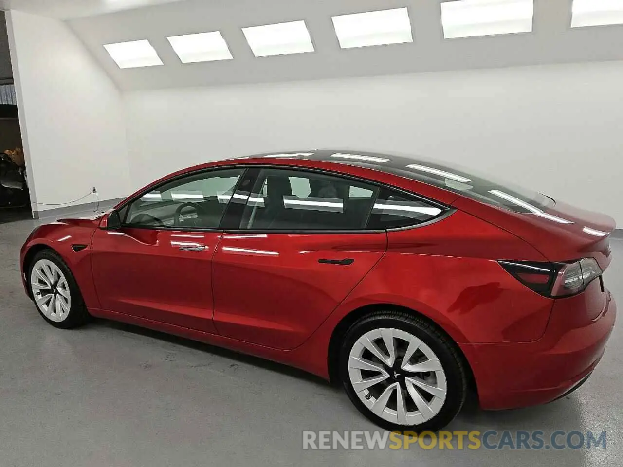 2 Photograph of a damaged car 5YJ3E1EBXNF291047 TESLA MODEL 3 2022