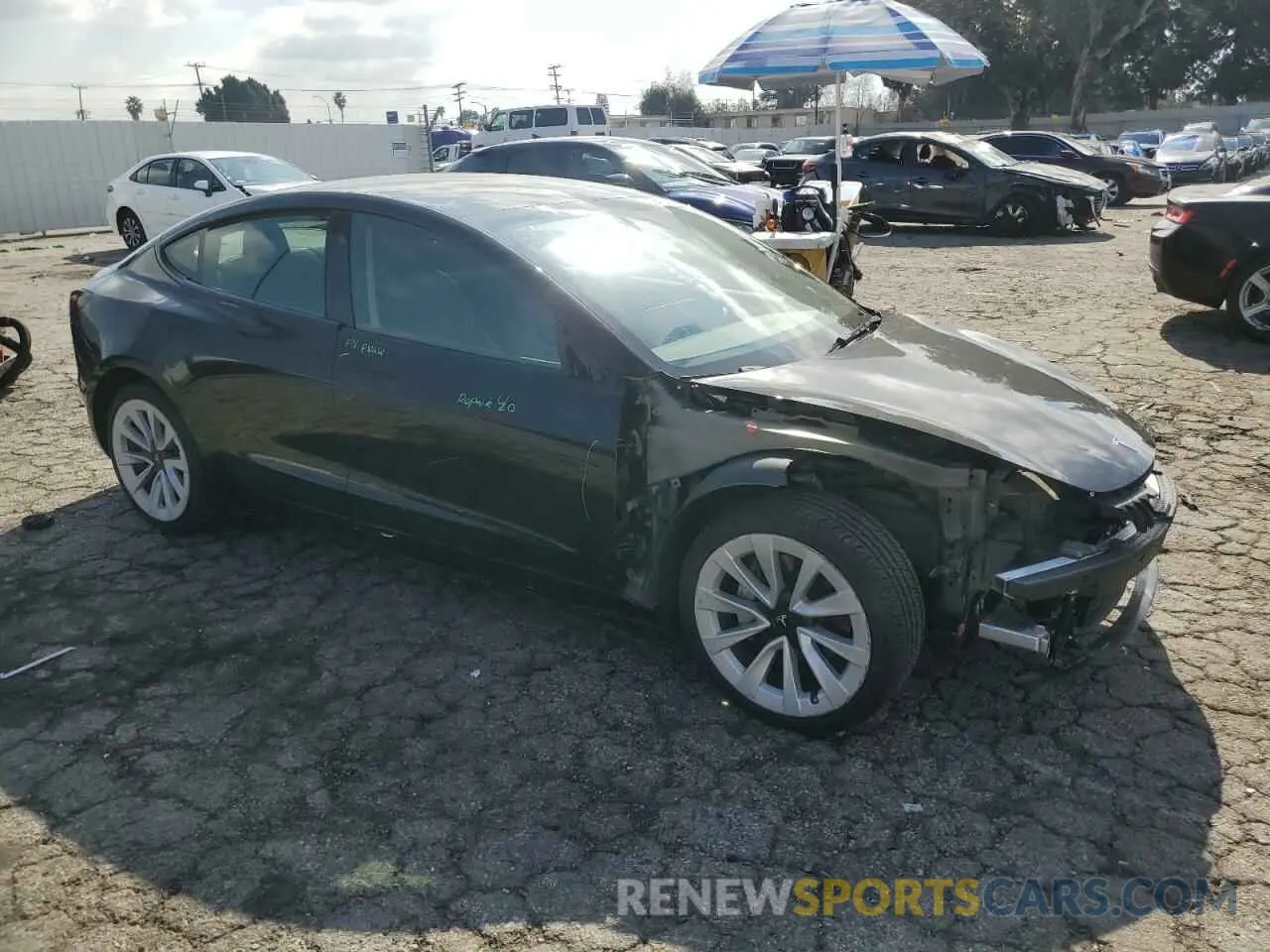 4 Photograph of a damaged car 5YJ3E1EBXNF304895 TESLA MODEL 3 2022