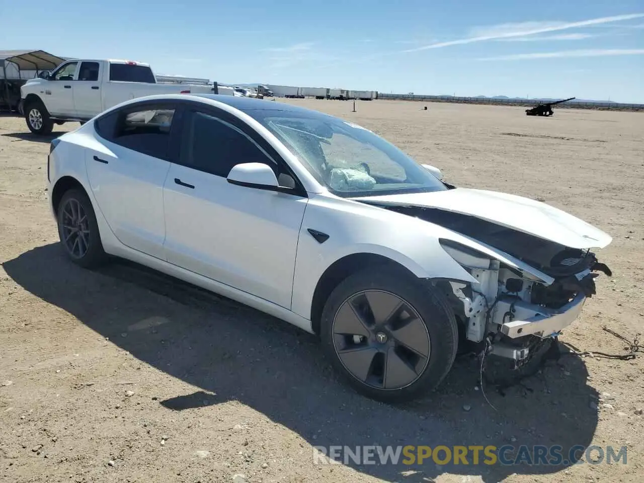 4 Photograph of a damaged car 5YJ3E1EBXNF328856 TESLA MODEL 3 2022