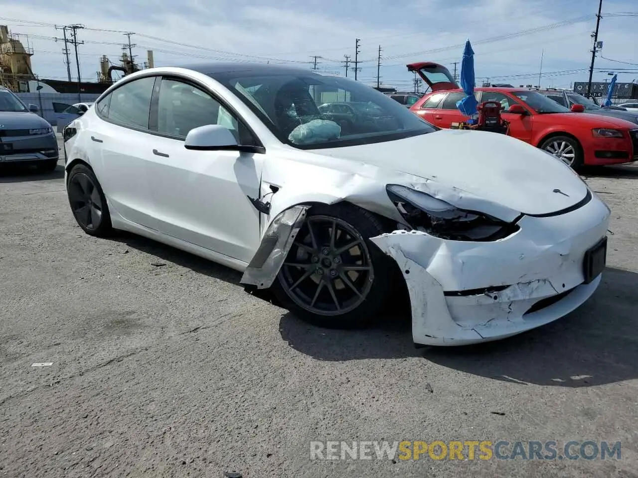 4 Photograph of a damaged car 5YJ3E1EBXNF330719 TESLA MODEL 3 2022