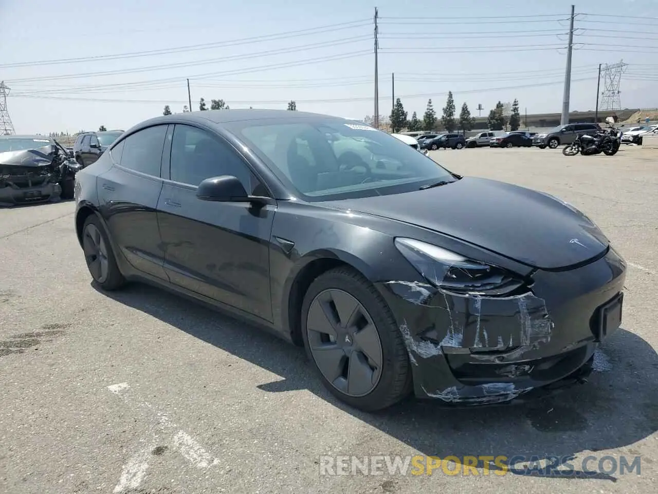 4 Photograph of a damaged car 5YJ3E1EBXNF333183 TESLA MODEL 3 2022