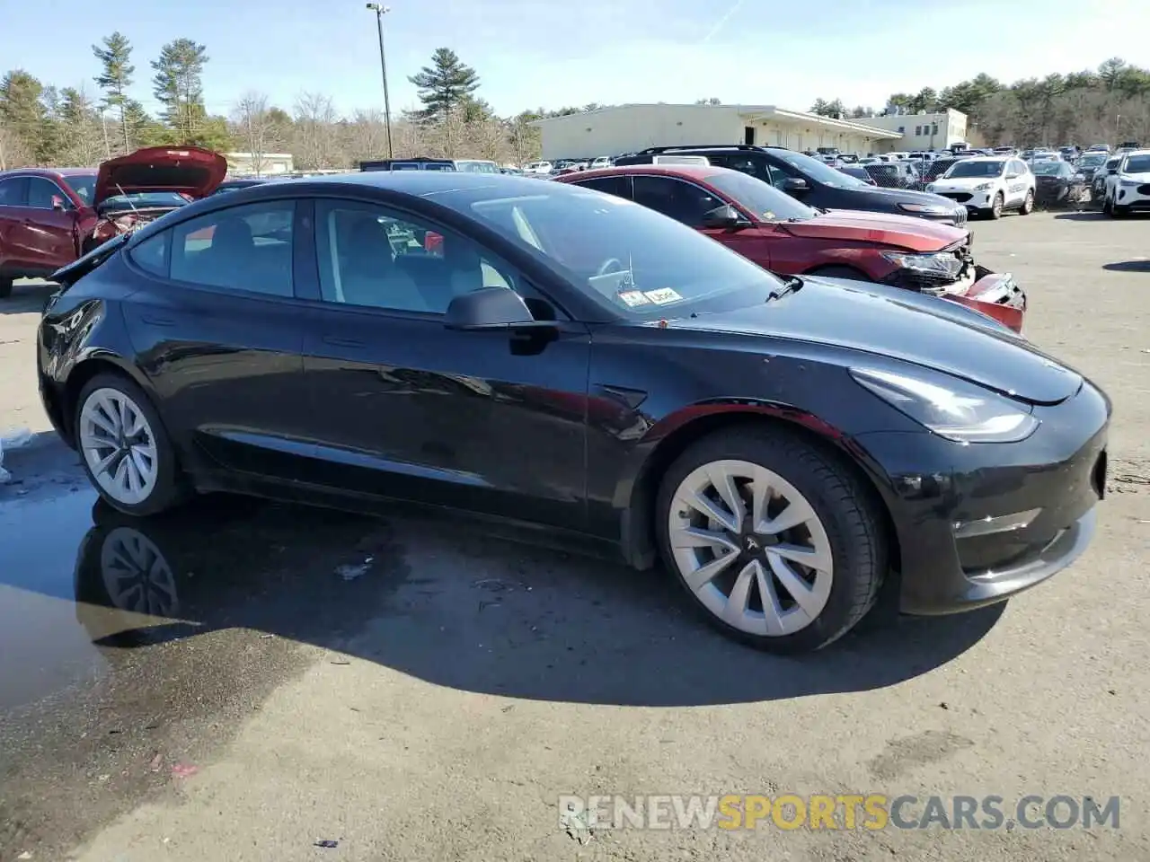 4 Photograph of a damaged car 5YJ3E1EBXNF333474 TESLA MODEL 3 2022