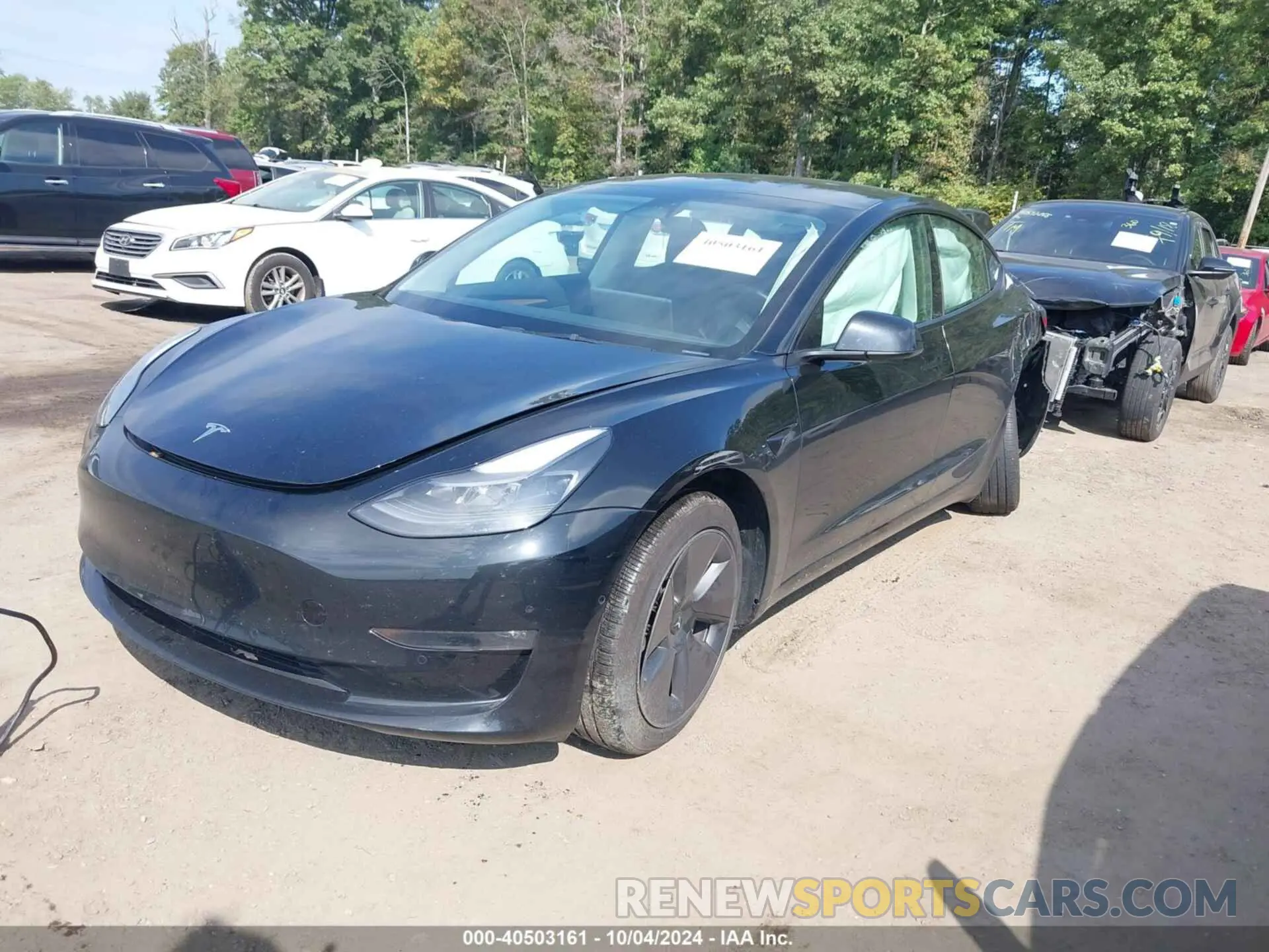 2 Photograph of a damaged car 5YJ3E1EBXNF349514 TESLA MODEL 3 2022