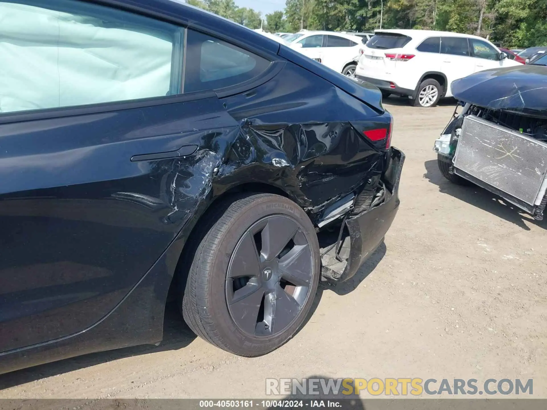 6 Photograph of a damaged car 5YJ3E1EBXNF349514 TESLA MODEL 3 2022