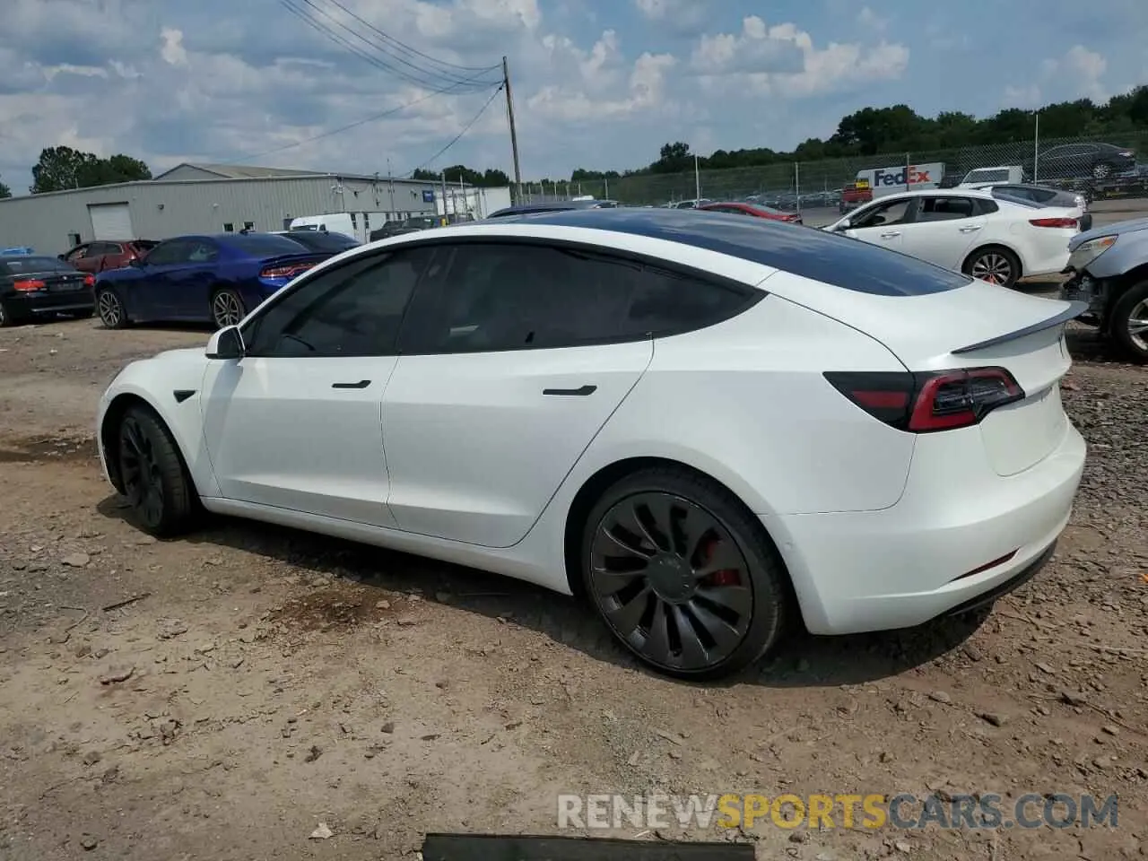 2 Photograph of a damaged car 5YJ3E1EC1NF104528 TESLA MODEL 3 2022