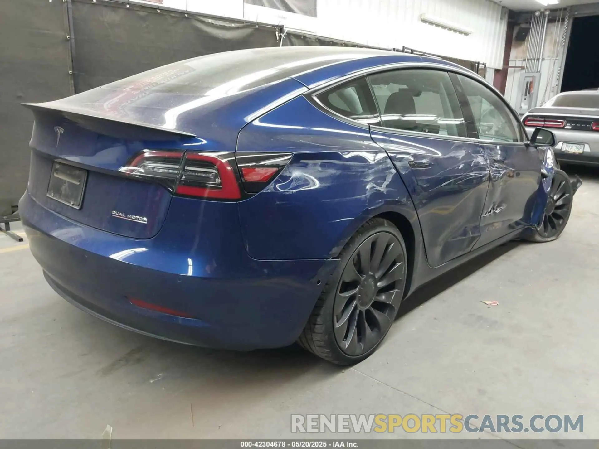4 Photograph of a damaged car 5YJ3E1EC1NF104786 TESLA MODEL 3 2022