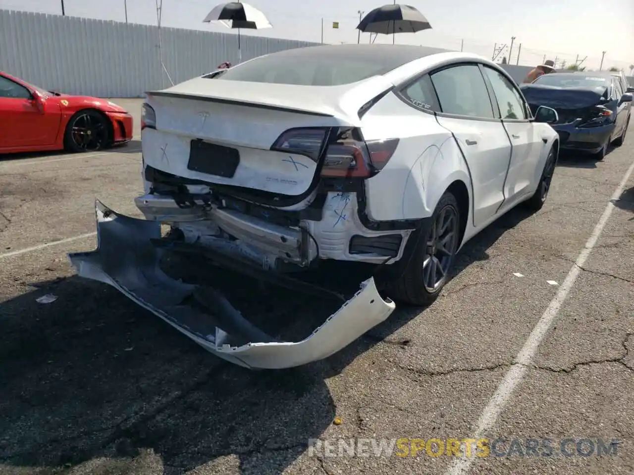 4 Photograph of a damaged car 5YJ3E1EC1NF131406 TESLA MODEL 3 2022