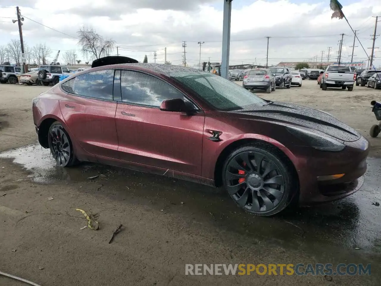 4 Photograph of a damaged car 5YJ3E1EC1NF170240 TESLA MODEL 3 2022