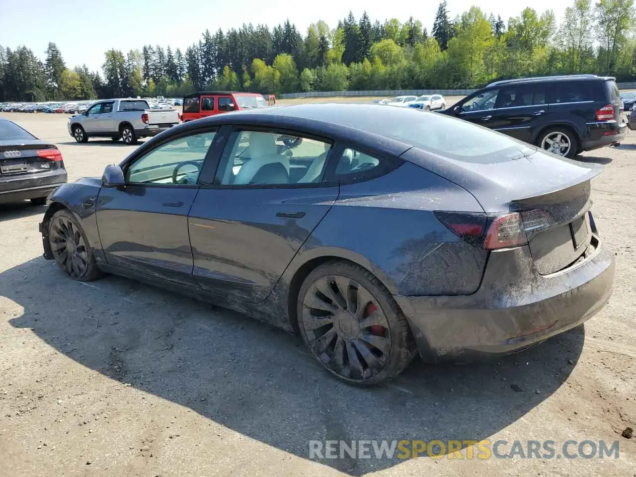 2 Photograph of a damaged car 5YJ3E1EC1NF262416 TESLA MODEL 3 2022