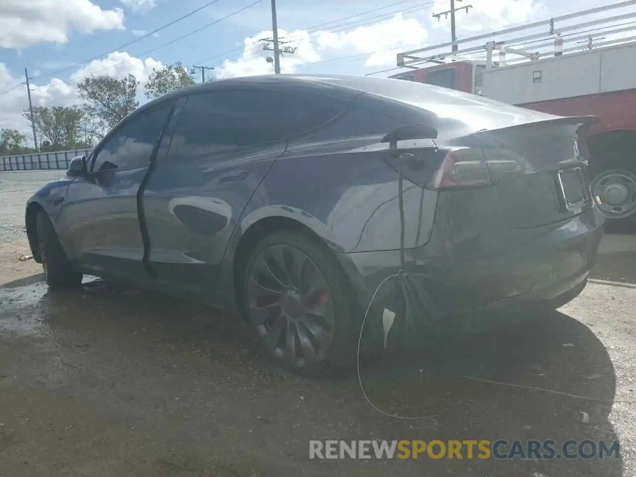 2 Photograph of a damaged car 5YJ3E1EC2NF127817 TESLA MODEL 3 2022