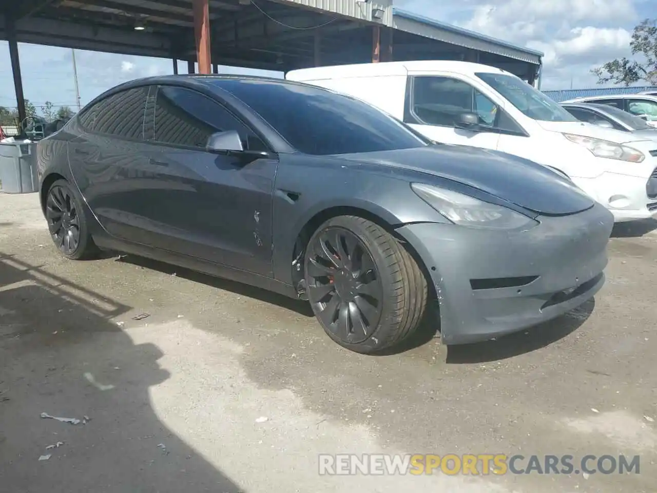 4 Photograph of a damaged car 5YJ3E1EC2NF127817 TESLA MODEL 3 2022