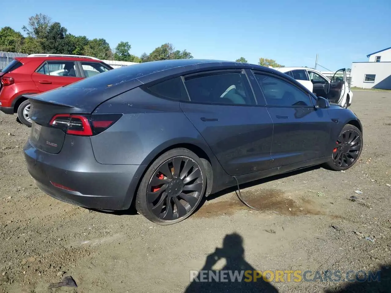 3 Photograph of a damaged car 5YJ3E1EC2NF261811 TESLA MODEL 3 2022