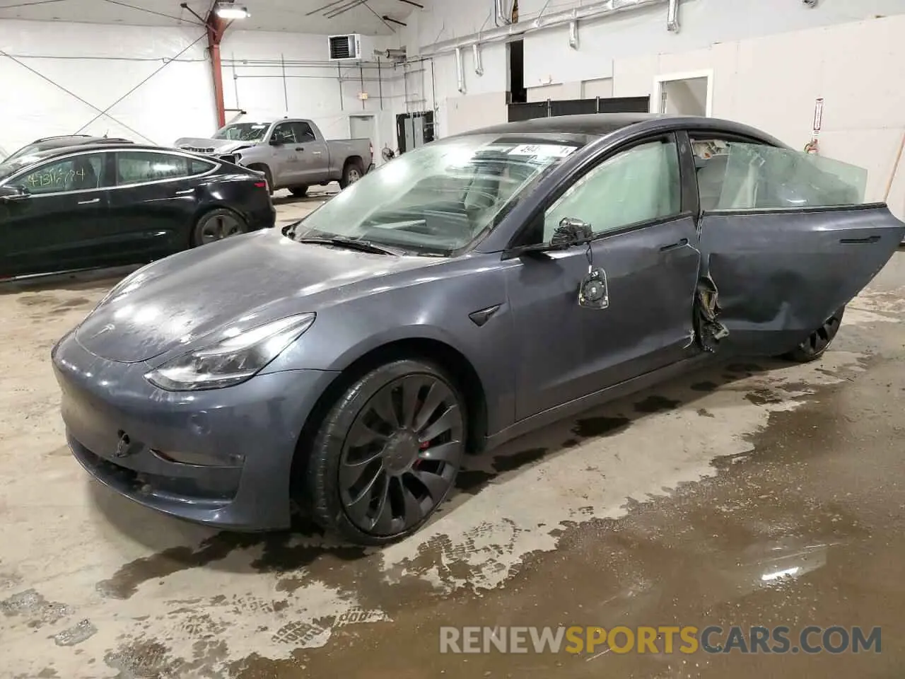 1 Photograph of a damaged car 5YJ3E1EC2NF337043 TESLA MODEL 3 2022