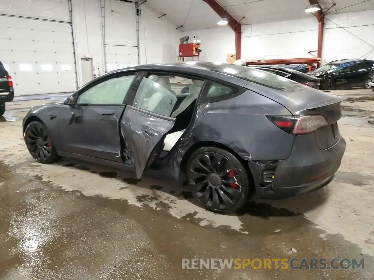 2 Photograph of a damaged car 5YJ3E1EC2NF337043 TESLA MODEL 3 2022