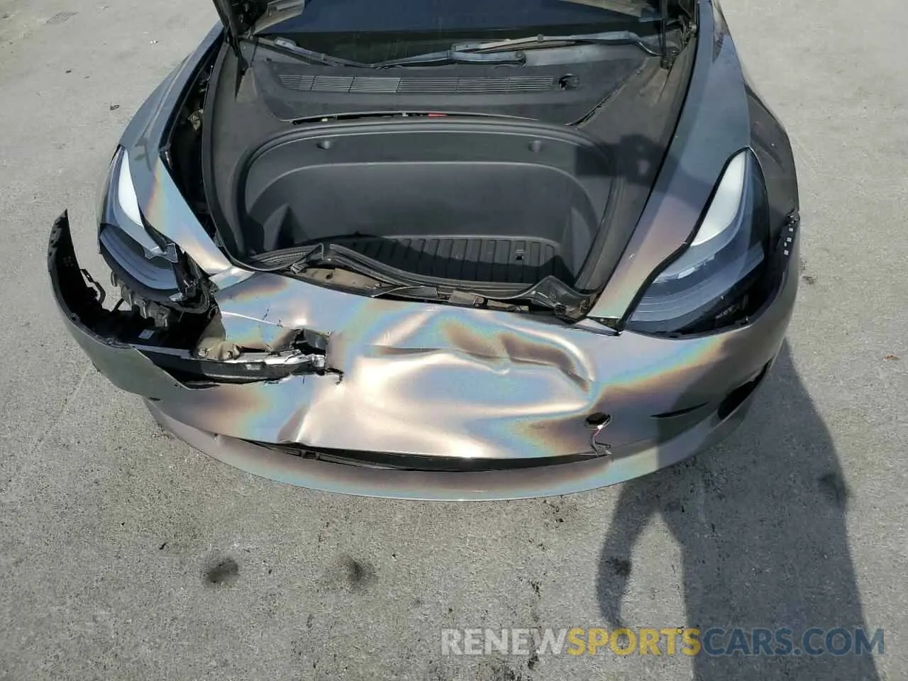 11 Photograph of a damaged car 5YJ3E1EC3NF128202 TESLA MODEL 3 2022