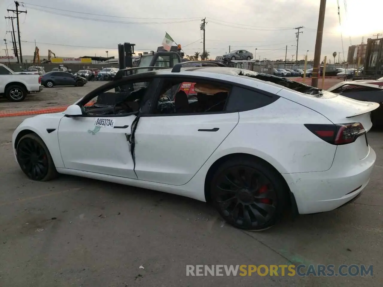 2 Photograph of a damaged car 5YJ3E1EC3NF265334 TESLA MODEL 3 2022