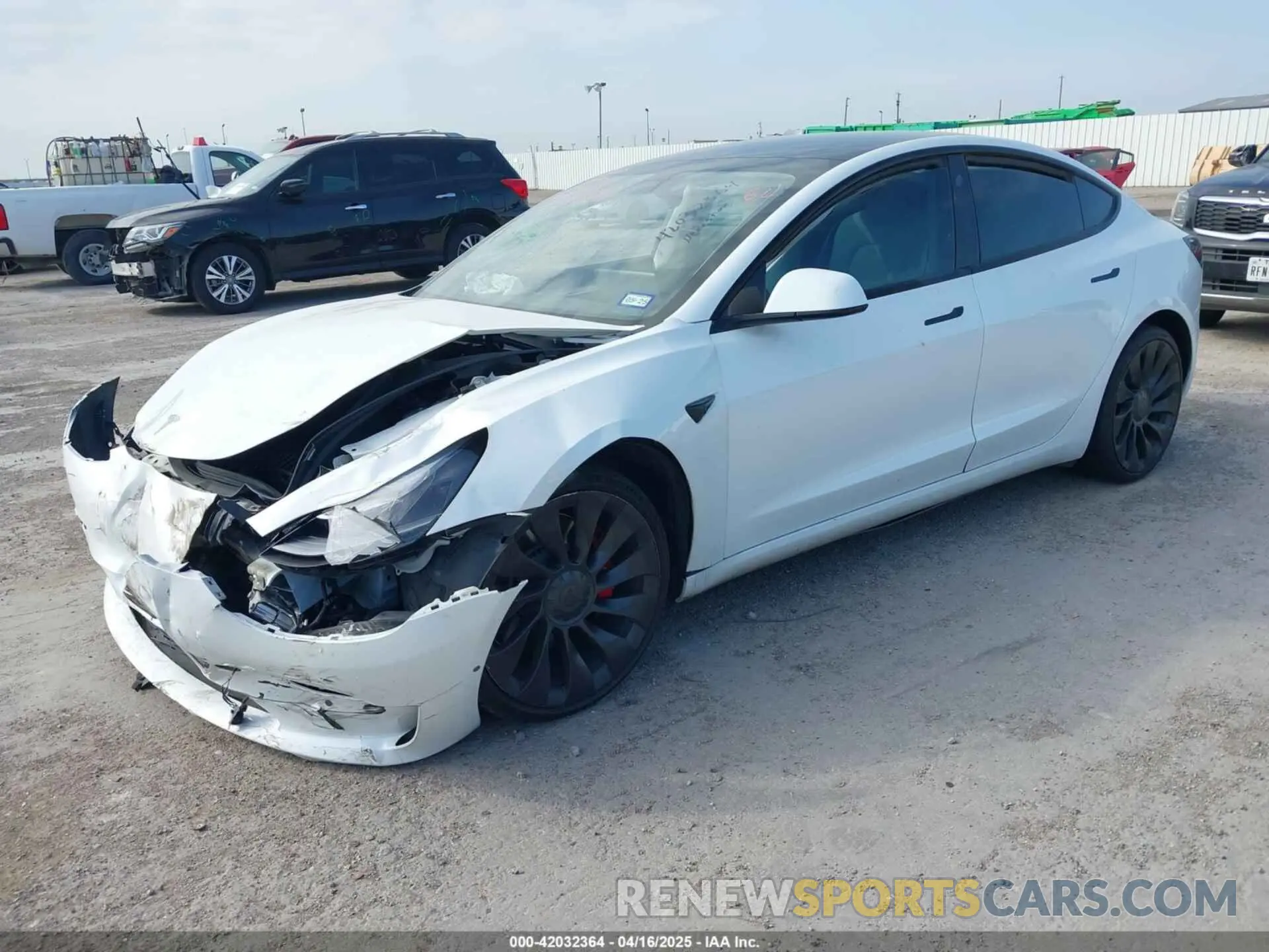 2 Photograph of a damaged car 5YJ3E1EC4NF134624 TESLA MODEL 3 2022