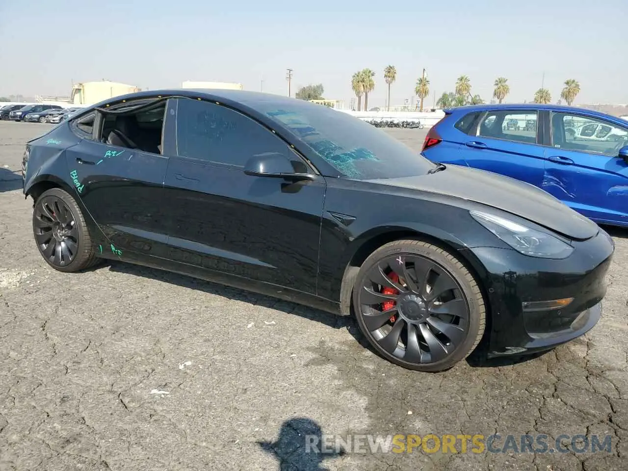 4 Photograph of a damaged car 5YJ3E1EC4NF209306 TESLA MODEL 3 2022