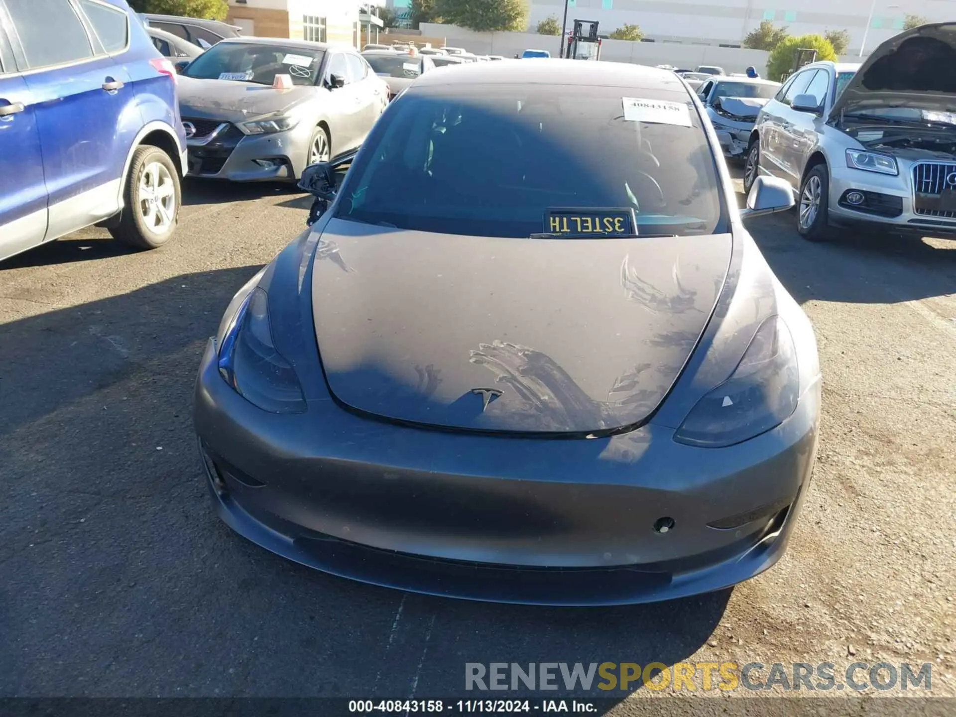 12 Photograph of a damaged car 5YJ3E1EC4NF265813 TESLA MODEL 3 2022
