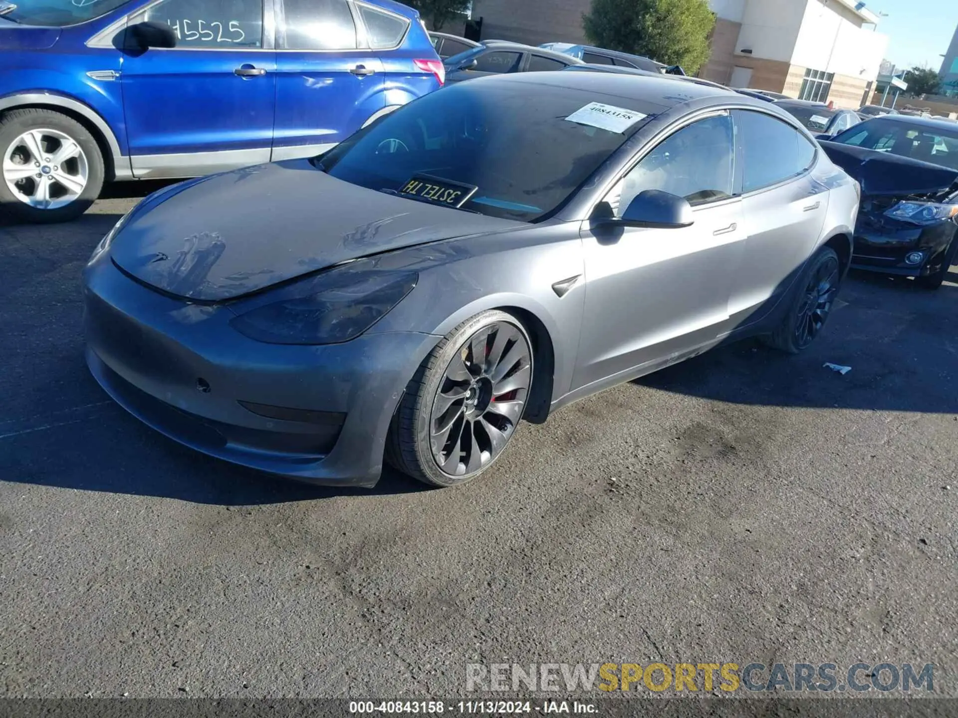2 Photograph of a damaged car 5YJ3E1EC4NF265813 TESLA MODEL 3 2022