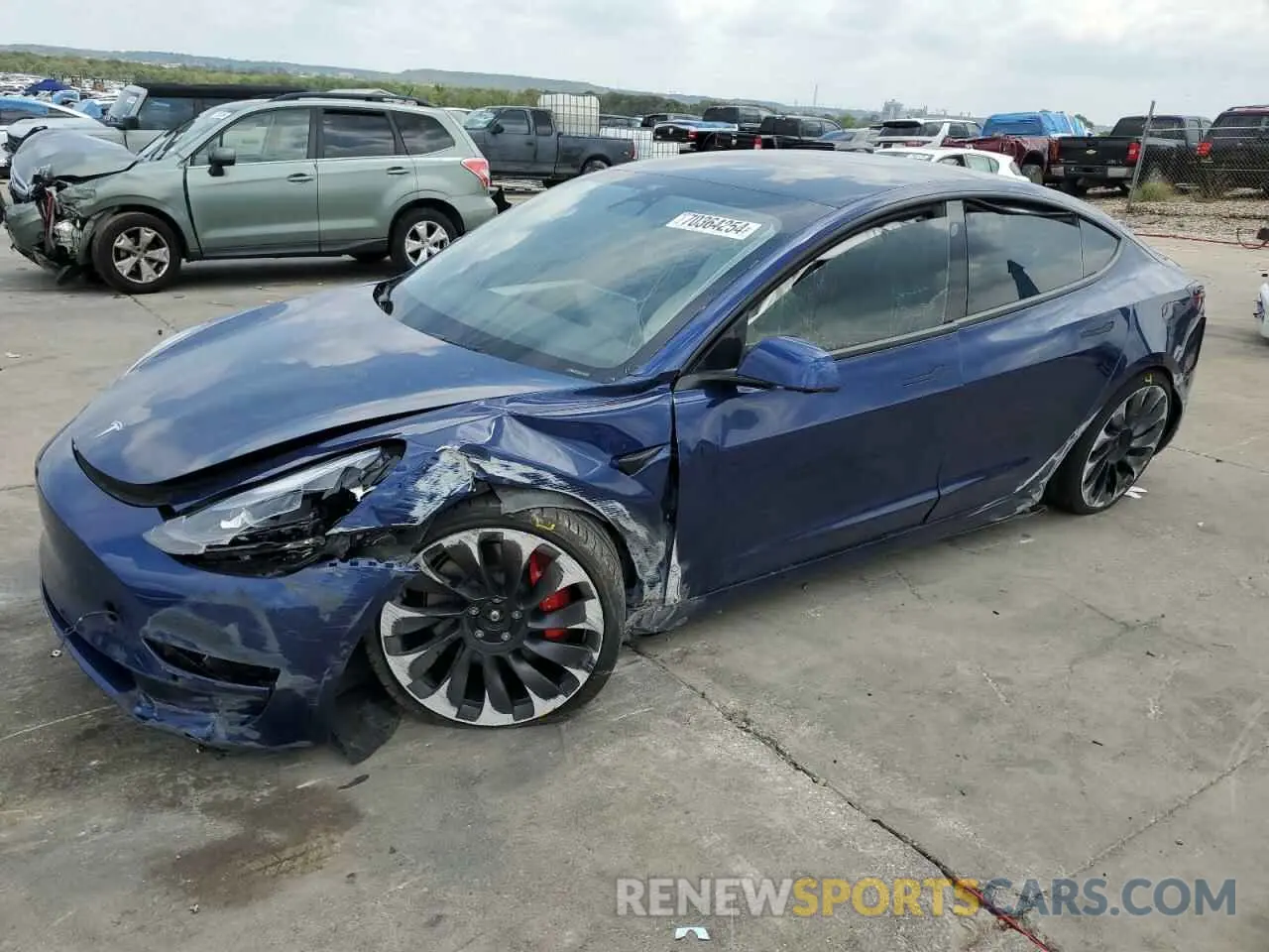 1 Photograph of a damaged car 5YJ3E1EC5NF198011 TESLA MODEL 3 2022