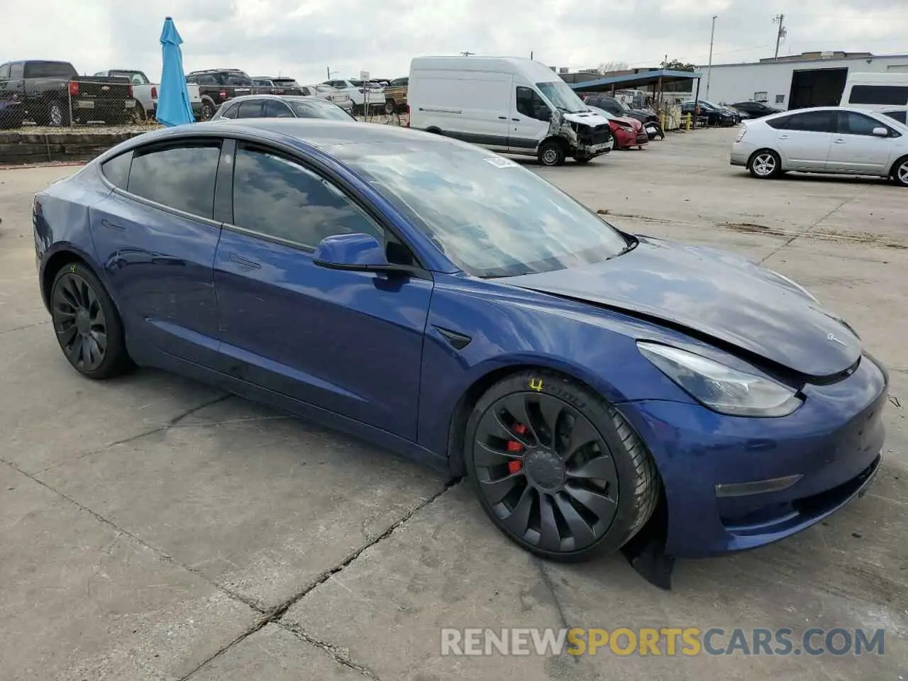 4 Photograph of a damaged car 5YJ3E1EC5NF198011 TESLA MODEL 3 2022