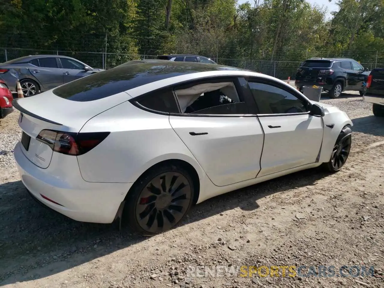 3 Photograph of a damaged car 5YJ3E1EC5NF274049 TESLA MODEL 3 2022